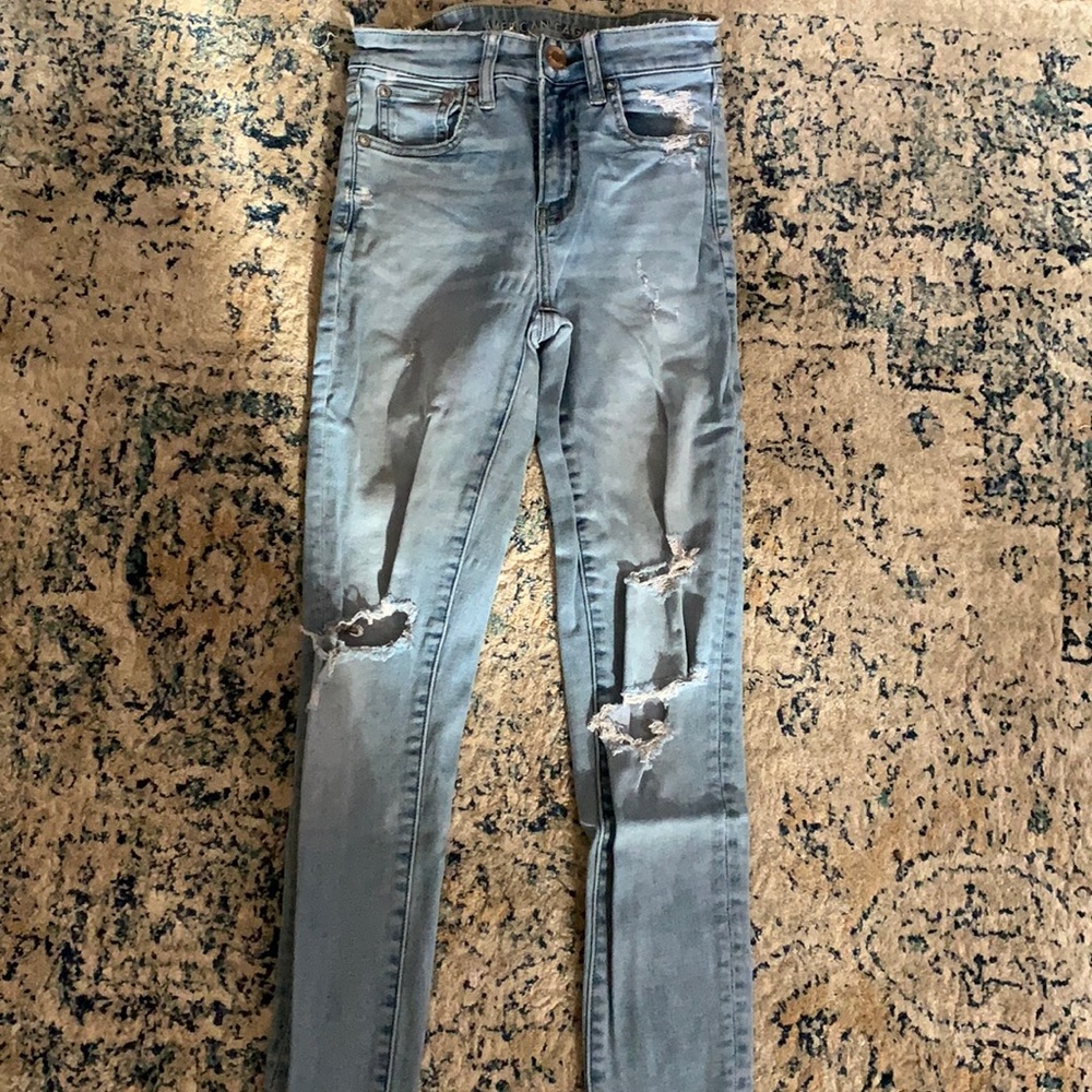 Skinny tight fit jeans. Fits around the waist with more room in the thigh area.